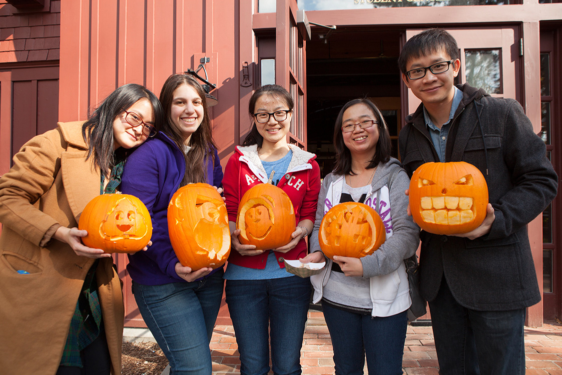 Students with carved pumpkins
