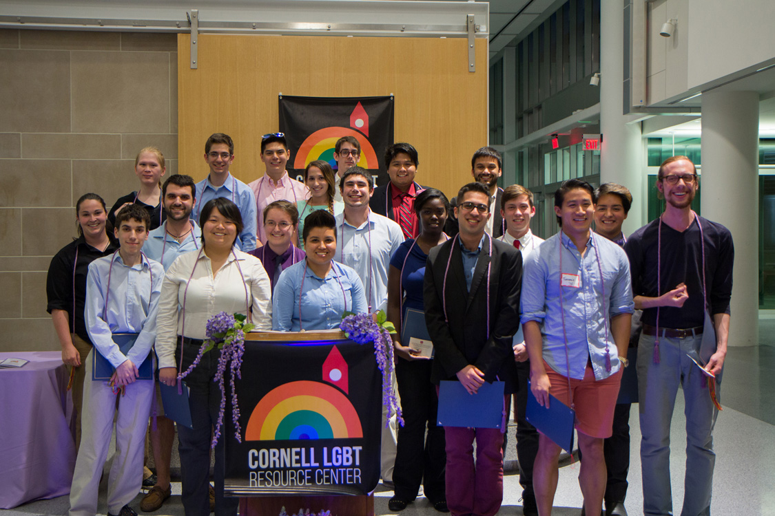 Students with a Cornell LGBT Resource Center banner