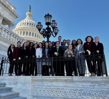 Cornell doctoral students with Representative Josh Riley outside the Capitol